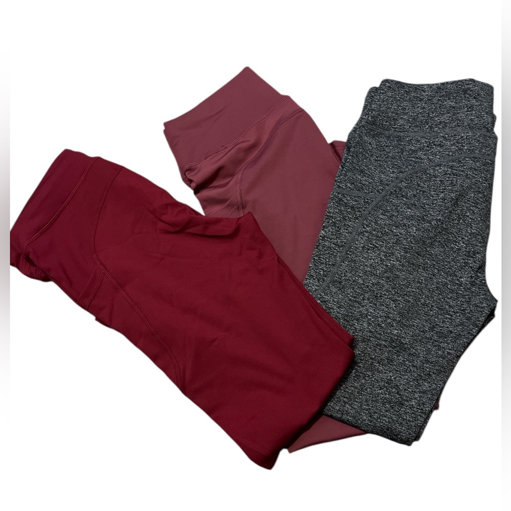 NWOT three pair of leggings grey/white, burgundy, rose colored w/pockets size XL